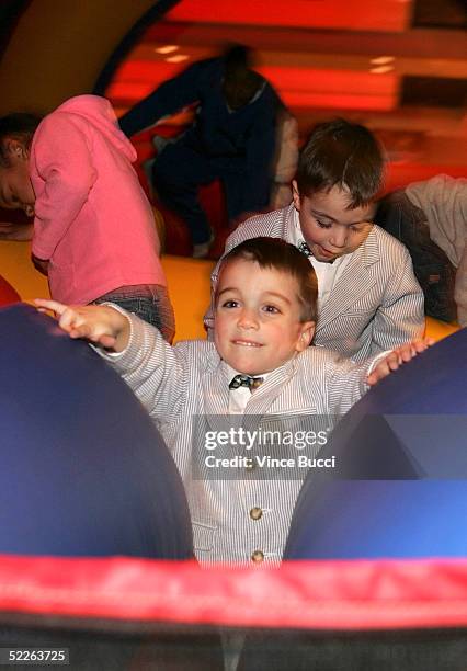 Actors Keegan and Logan Hoover play at the afterparty for the premiere of the Disney film "The Pacifier" on March 1, 2005 at The Annex in Hollywood,...