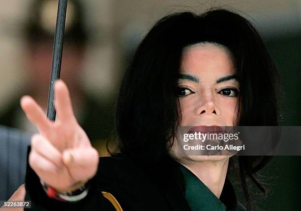 Michael Jackson arrives at the Santa Barbara Court House before the third day of his child molestation trial March 2, 2005 in Santa Maria,...