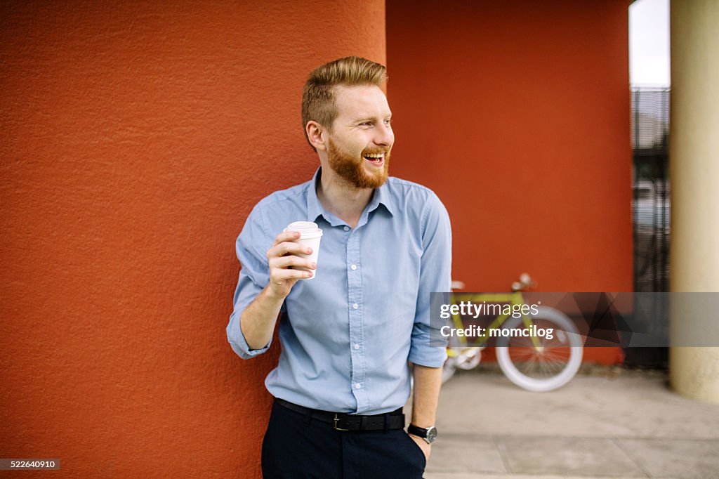 Handsome male drinking coffee