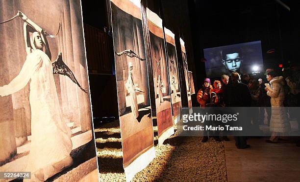 Visitors take in the new Nomadic Museum during a press preview for ?Ashes and Snow,? a multimedia exhibit by artist Gregory Colbert, March 2, 2005 in...