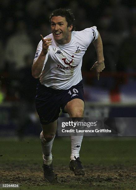 Robbie Keane of Spurs celebrates his goal during the FA Cup Fifth Round Replay match between Nottingham Forest and Tottenham Hotspur at The City...
