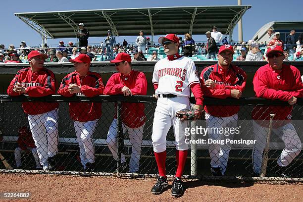 Jamey Carroll of the Washington Nationals and his teammates prepare to take the field against the New York Mets during MLB Spring Training action on...