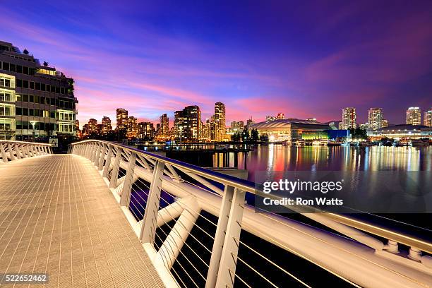 view from olympic village across false creek to downtown - vancouver bridge stock pictures, royalty-free photos & images