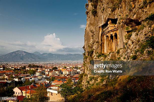 lycian rock-cut tombs above fethiye in turkey - fethiye stock pictures, royalty-free photos & images