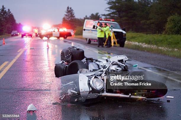 motorcycle accident on trans canada highway - choque fotografías e imágenes de stock
