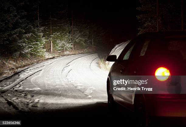 winter road at night - headlamp stock pictures, royalty-free photos & images