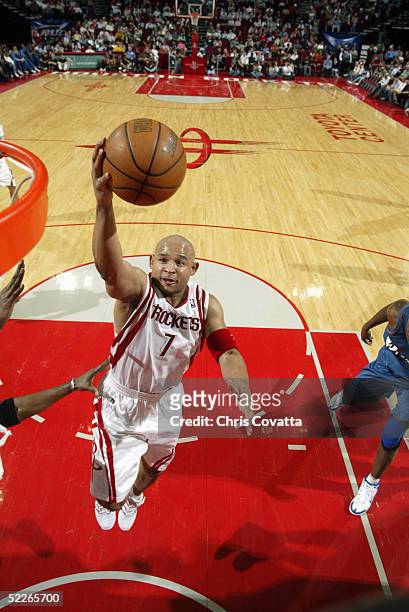 David Wesley of the Houston Rockets shoots a layup against the Washington Wizards during the game on February 15, 2005 at the Toyota Center in...