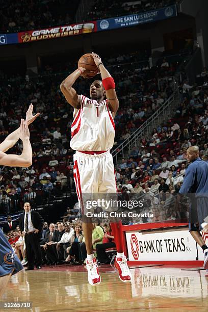 Tracy McGrady of the Houston Rockets shoots against the Washington Wizards during the game on February 15, 2005 at the Toyota Center in Houston,...