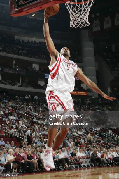 Juwan Howard of the Houston Rockets shoots against the Washington Wizards during the game on February 15, 2005 at the Toyota Center in Houston,...