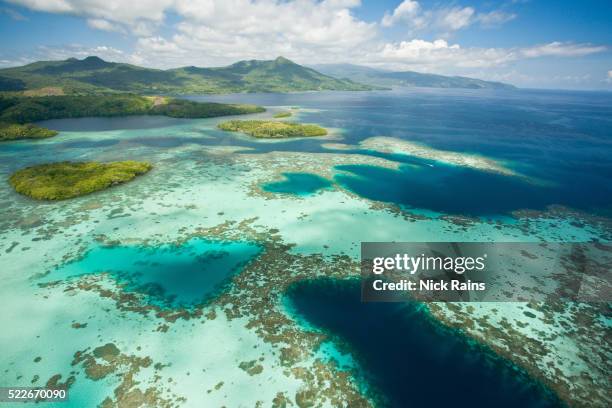 aerial view of fergusson island, png - パプアニューギニア ストックフォトと画像