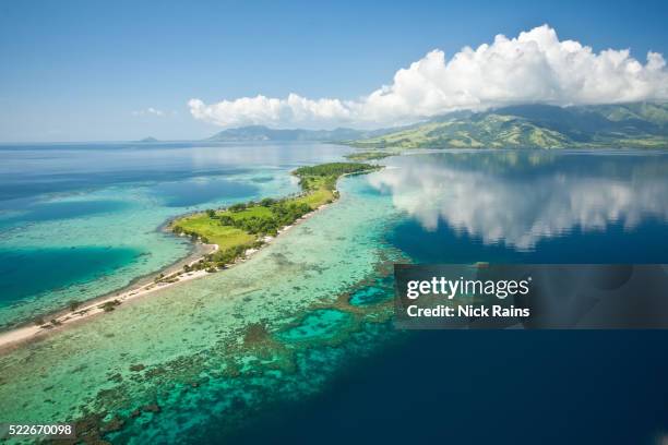 aerial view of fergusson island, png - papua new guinea stock pictures, royalty-free photos & images