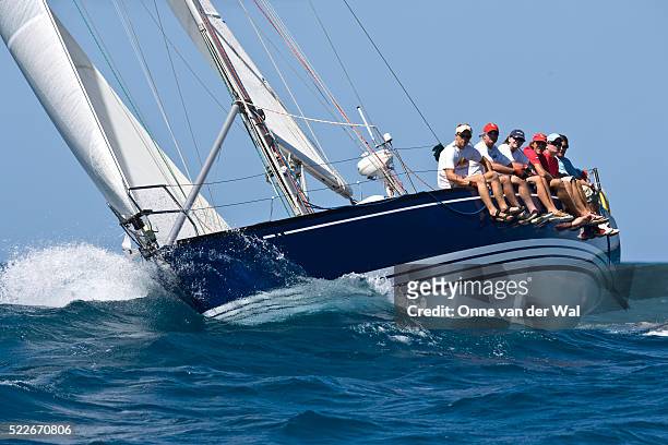 sailing crew racing during grenada sailing festival - yachting race stock pictures, royalty-free photos & images