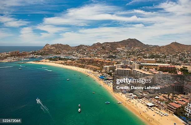 resorts line medano beach at cabo san lucas - baja california sur fotografías e imágenes de stock