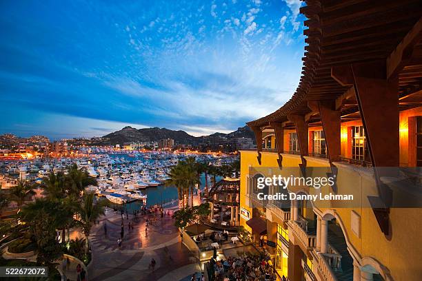restaurants and shops at the marina in cabo san lucas - baja california sur fotografías e imágenes de stock