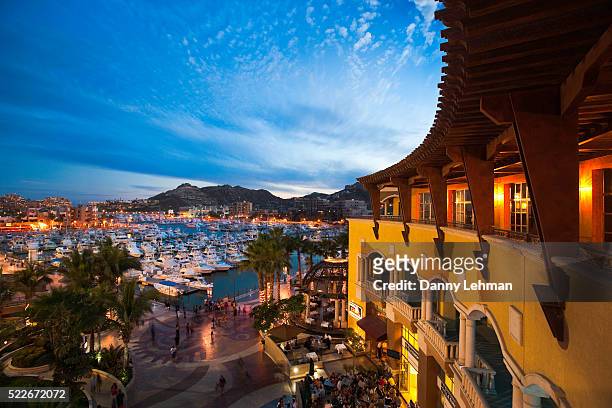 restaurants and shops at the marina in cabo san lucas - méxico stock pictures, royalty-free photos & images