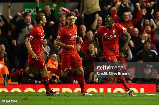 Mamadou Sakho of Liverpool celebrates scoring his sides second goal during the Barclays Premier League match between Liverpool and Everton at...