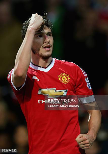 Matteo Darmian of Manchester United celebrates after scoring his sides second goal during the Barclays Premier League match between Manchester United...