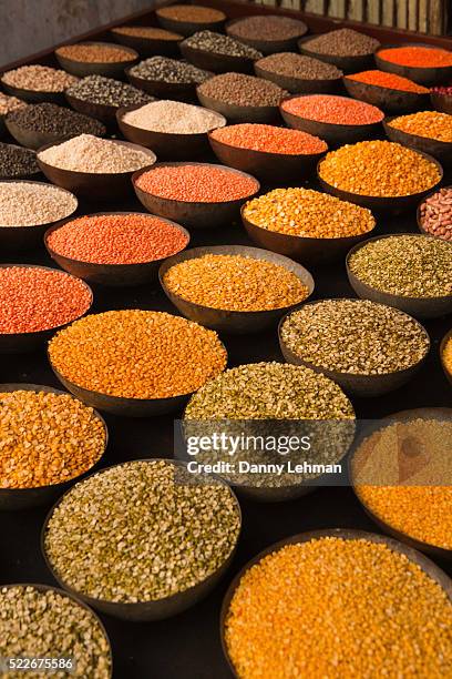 pulses (a preparation of dried lentils, peas or beans) sold in old delhi food market - lentil stock pictures, royalty-free photos & images