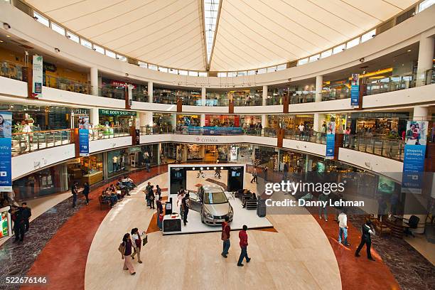 dlf emporio mall, new delhi, india - shopping mall stock pictures, royalty-free photos & images