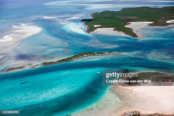 aerial view of exuma cays, bahamas - bahamas aerial stockfoto's en -beelden