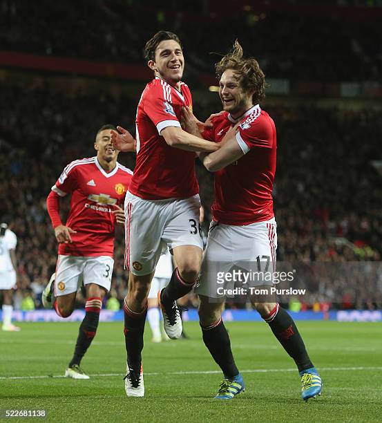 Matteo Darmian of Manchester United celebrates scoring their second goal during the Barclays Premier League match between Manchester United and...