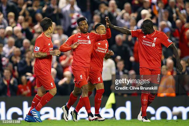 Daniel Sturridge of Liverpool celebrates with Mamadou Sakho of Liverpool after scoring his sides third goal during the Barclays Premier League match...