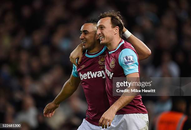 Mark Noble of West Ham United celebrates with Dimitri Payet of West Ham United scoring his second goal during the Barclays Premier League match...