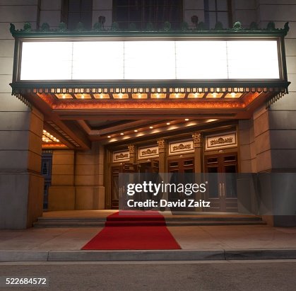 Movie theater entrance and marquee Movie theater entrance and marquee