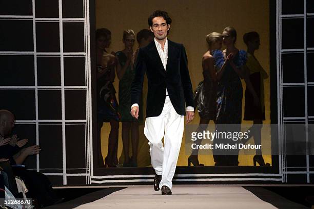 French designer Vincent Darre walks on stage at the Emanuel Ungaro fashion show as part of Paris Fashion Week Ready To Wear Autumm/Winter 2006 on...