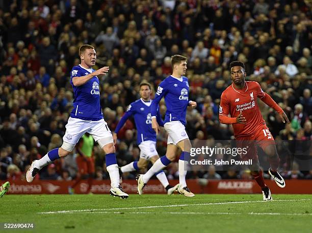 Daniel Sturridge of Liverpool ceelbrates scoring a goal during the Barclays Premier League match between Liverpool and Everton at Anfield on April...