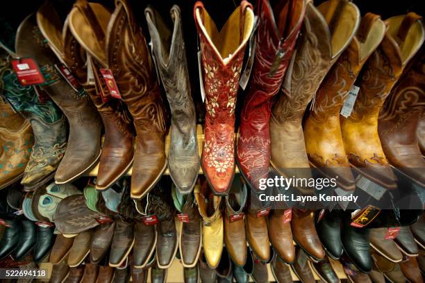 boot barn boot selection at minnesota's mall of america - cowboy boots stock pictures, royalty-free photos & images