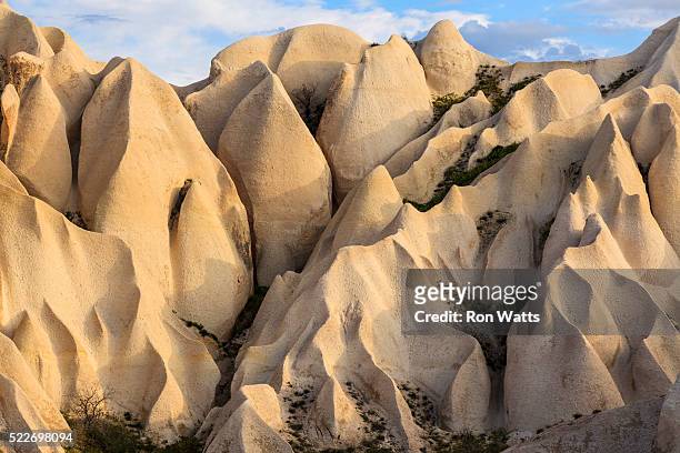 eroded forms in cappadocia, turkey - cappadocia stock pictures, royalty-free photos & images