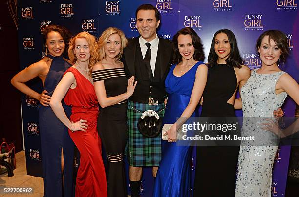 Darius Campbell poses with cast members Joelle Dyson, Clare Rickard, Rebecca Fennelly, Leah Harris, Sanchia Amber Clarke and Emma Caffrey at the...