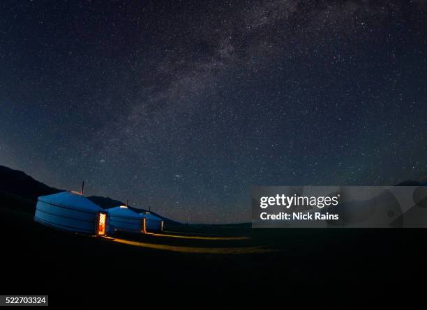 stars over mongolian gers, orkhon river valley, gobi desert - rundzelt stock-fotos und bilder