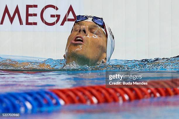 Cesar Cielo of Brazil reacts after swimming the Men's 50m Freestyle finals during the Maria Lenk Trophy competition at the Aquece Rio Test Event for...