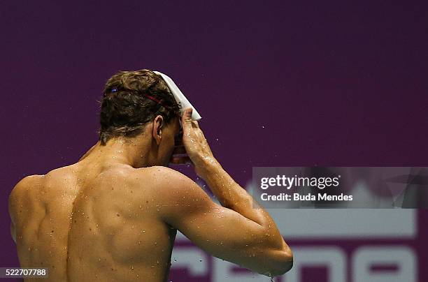 Cesar Cielo of Brazil reacts after swimming the Men's 50m Freestyle finals during the Maria Lenk Trophy competition at the Aquece Rio Test Event for...