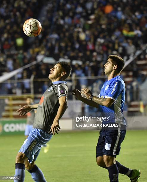 Nelson Cabrera of Bolivia's Bolivar, vies for the ball with Nicolas Sanchez , of Argentina's Racing Club, during their 2016 Copa Libertadores...