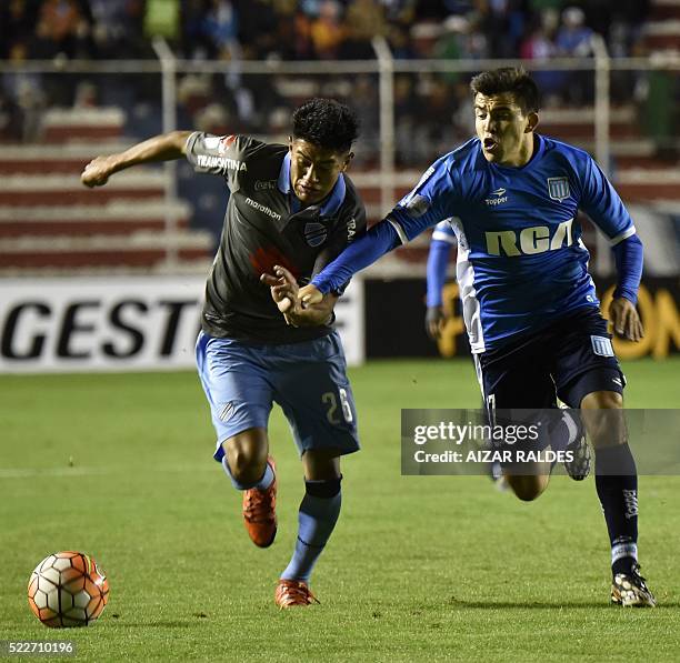Edwin Saavedra of Bolivia's Bolivar, vies for the ball with Marcos Acuña , of Argentina Racing Club, during their 2016 Copa Libertadores football...