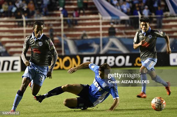 Jaime Arrascaita of Bolivia's Bolivar, vies for the ball with Marcos Acuña , of Argentina Racing Club, during their 2016 Copa Libertadores football...