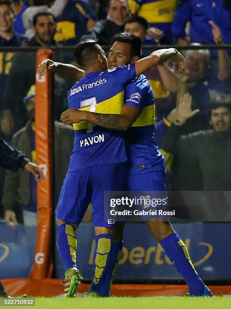 Andres Chavez of Boca Juniors celebrates with Cristian Pavón after scoring the third goal of his team during a match between Boca Juniors and...