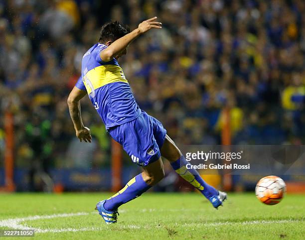 Andres Chavez of Boca Juniors shoots to score the third goal of his team during a match between Boca Juniors and Deportivo Cali as part of Copa...