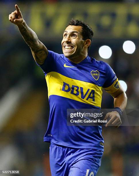 Carlos Tevez of Boca Juniors celebrates after scoring the fourth goal of his team during a match between Boca Juniors and Deportivo Cali as part of...