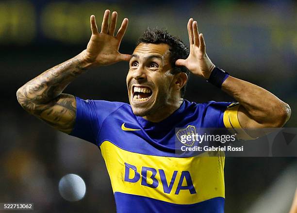 Carlos Tevez of Boca Juniors celebrates after scoring the fourth goal of his team during a match between Boca Juniors and Deportivo Cali as part of...