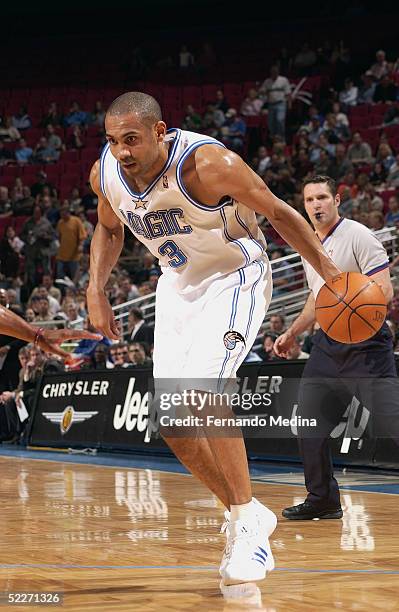 Grant Hill of the Orlando Magic drives against the Golden State Warriors during the game at TD Waterhouse Centre on February 8, 2005 in Orlando,...