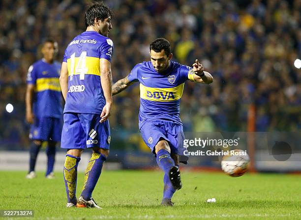 Carlos Tevez of Boca Juniors takes a free kick to score the fourth goal of his team during a match between Boca Juniors and Deportivo Cali as part of...