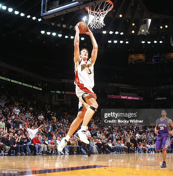 Mike Dunleavy Jr. #34 of the Golden State Warriors drives to the basket during a game against the Phoenix Suns at The Arena in Oakland on February...