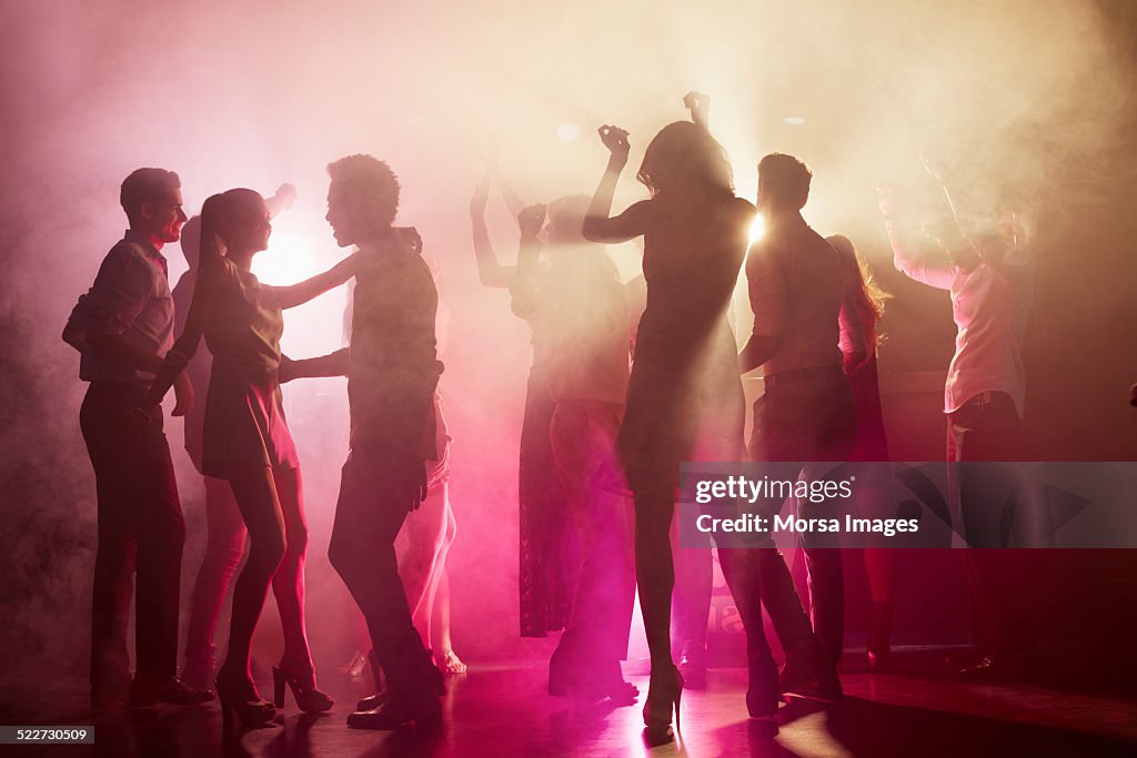 People dancing at nightclub