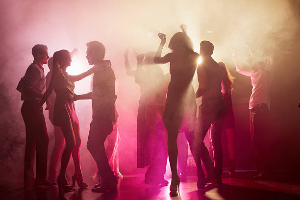  people dancing at nightclub - night club stock pictures, royalty-free photos & images