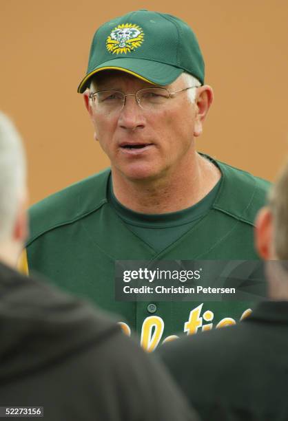 Manager Ken Macha of the Oakland Athletics talks with the media before the MLB spring training game against the Chicago Cubs at Phoenix Municipal...