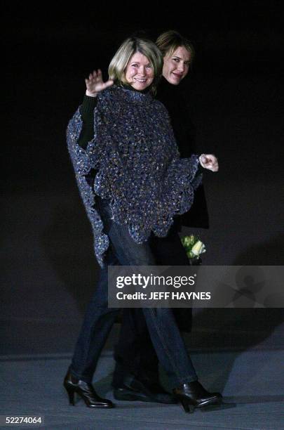 Martha Stewart walks with her daughter Alexis to board a chartered plane at the Greenbrier Valley Airport in Lewisburg, West Virginia 04 March, 2005...